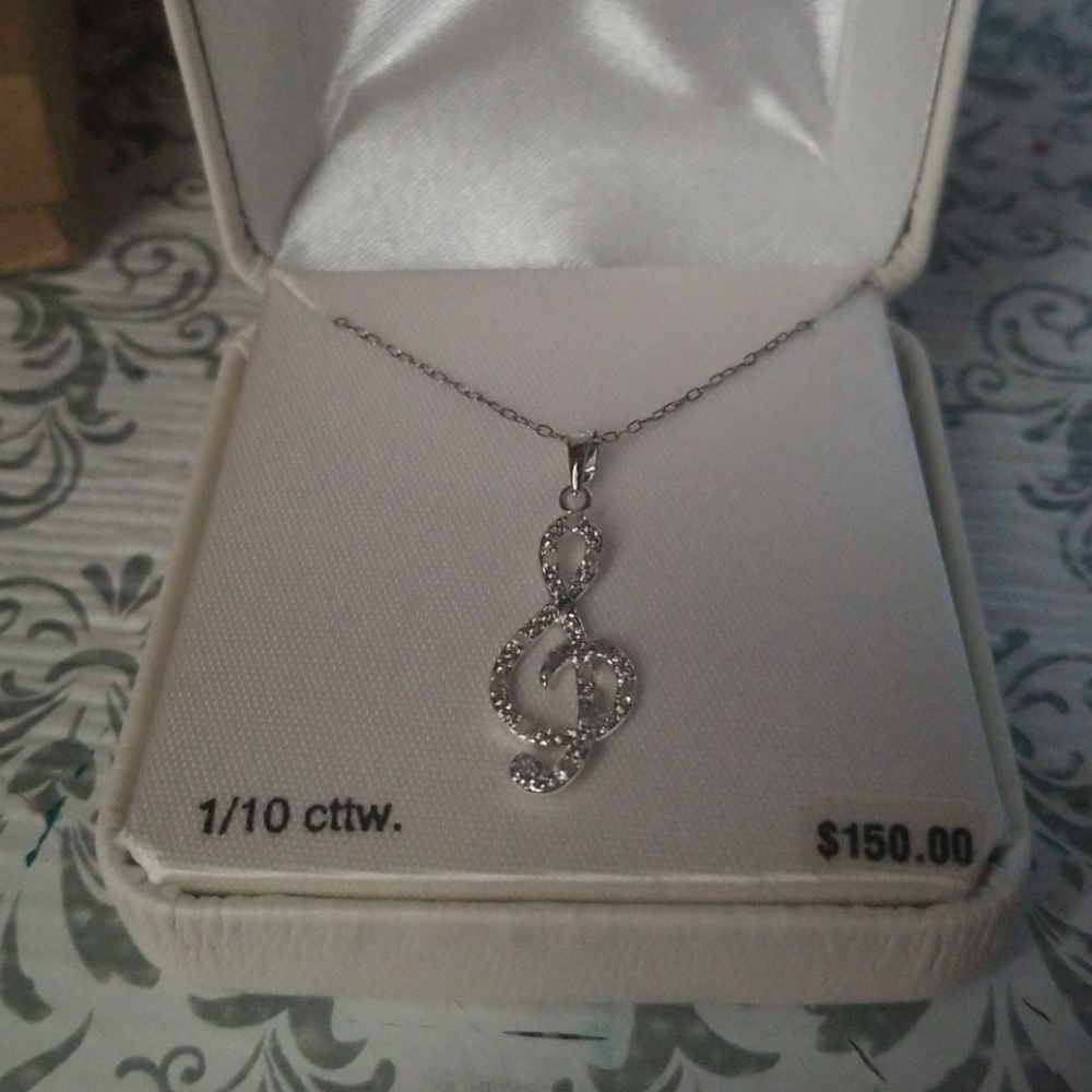 Treble cleft necklace